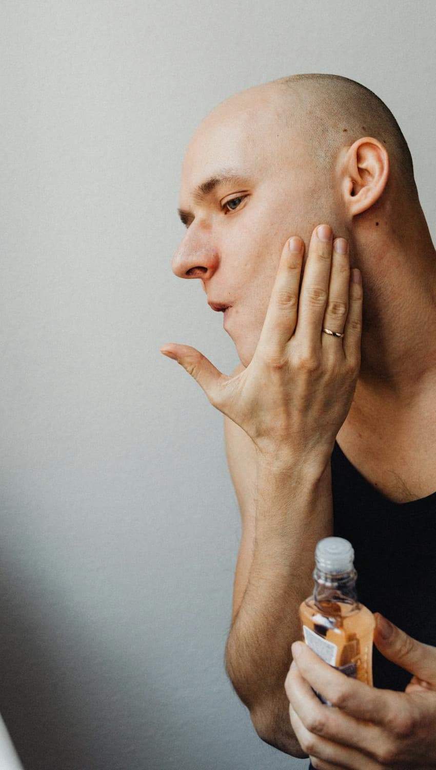 Close-up editorial image representing a cared-for shaved scalp